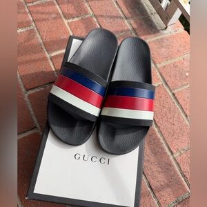 Gucci Men's Blue Slides with Red, Blue, and White Stripes